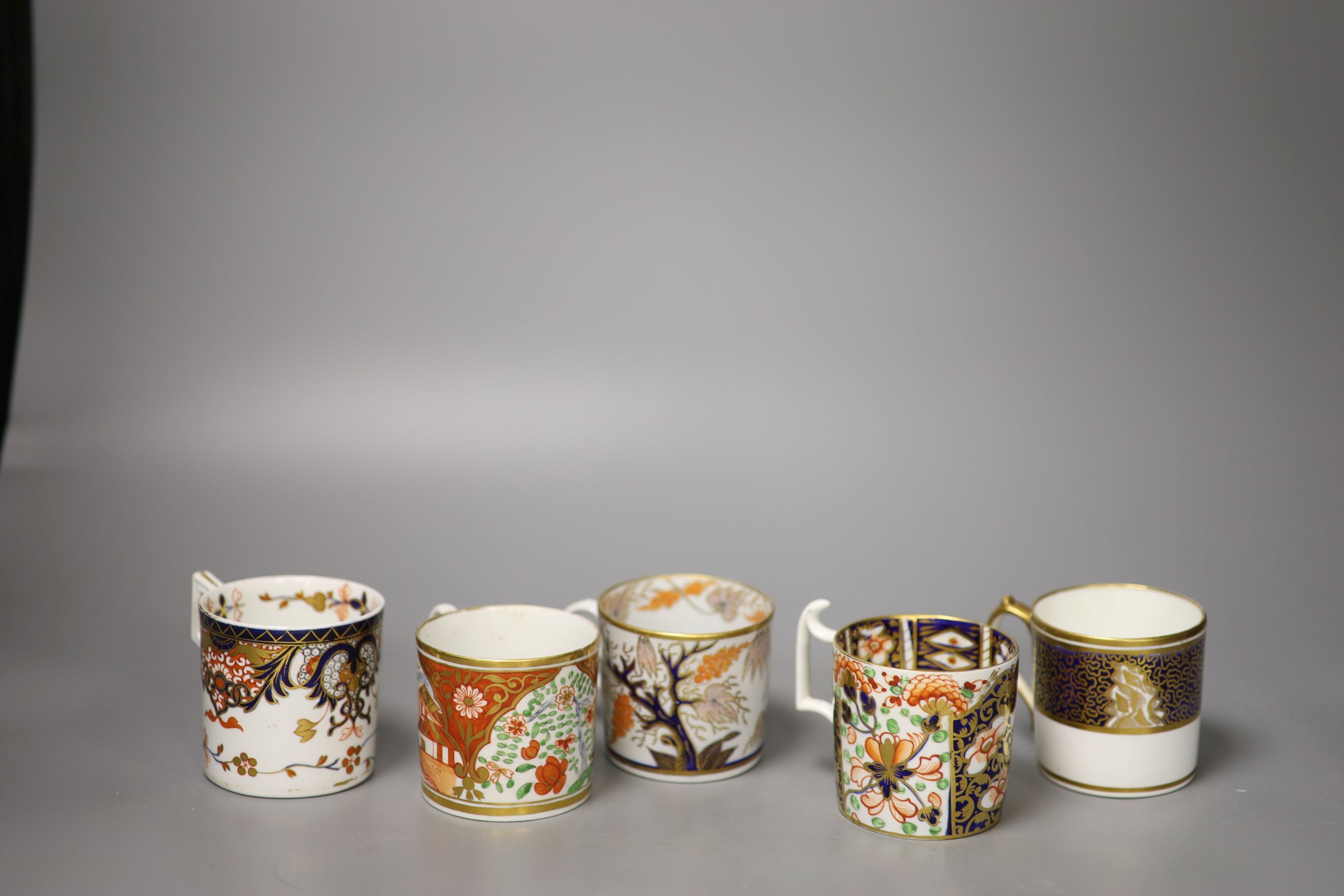 Five English coffee cans,